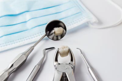 photo of a tooth being held by a dental appliance